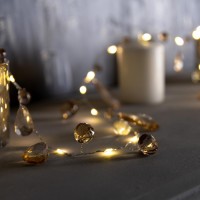 Гирлянда «Нить» 2 м роса с насадками «Золотистые лепестки», IP20, серебристая нить, 40 LED, свечение тёплое белое, ААх3