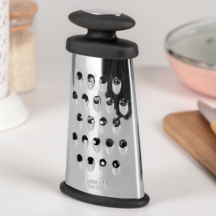 Тёрка овальная «Профи», 16×8×5 см, прорезиненная Тёрка овальная «Профи», 16×8×5 см, прорезиненная