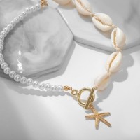 Чокер «Морская звезда», белый в золоте, 42 см