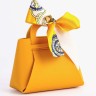 Кожаная подарочная сумочка для бижутерии и сувениров, жёлтая с бантом (лента), 13×12×5.5 см