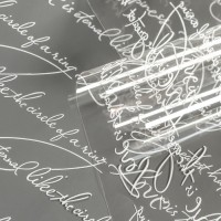 Пленка для цветов «Рукопись» прозрачная с белым рисунком, 0.7×8.2 м, 40 мкм