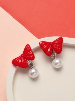 Серьги-клипсы детские «Выбражулька» бант с жемчужиной, красно-белые